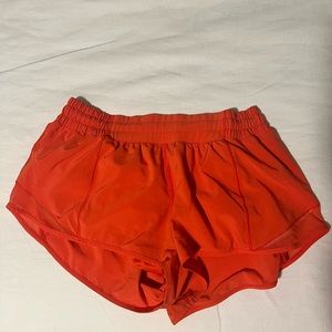 Lululemon Orange Hotty Hot 2.5 inch shorts Size 8